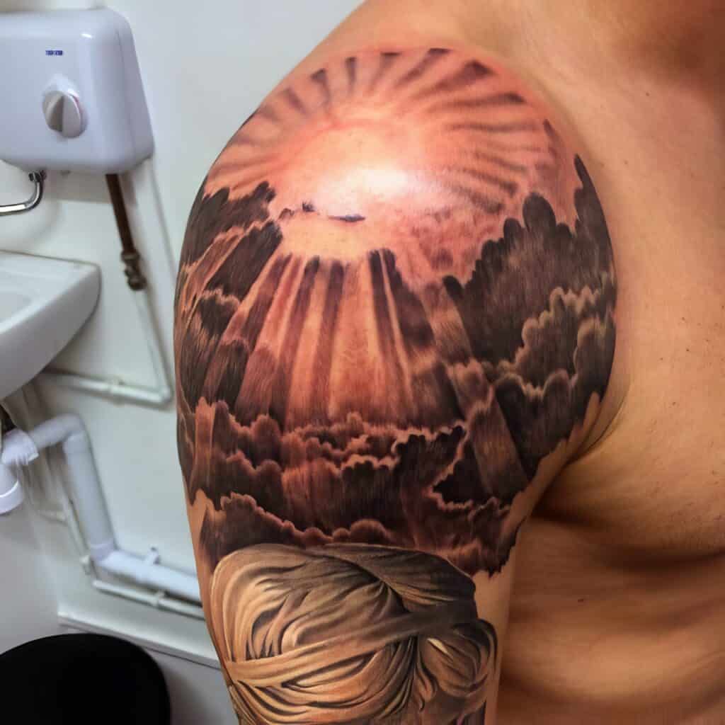 Tattoo uploaded by Trevor Robson • Fancy this as my first ever tattoo but  on top half of my arm with a sun shining over it with lose family members  names looking