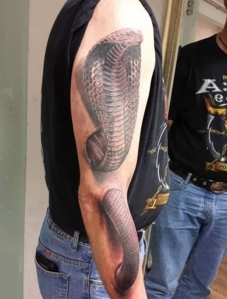 89 Slippery Snake Tattoos for Men [2024 Inspiration Guide]