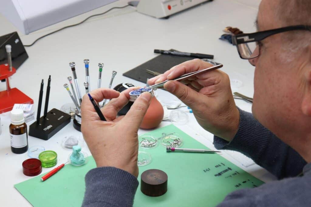 Watchmaker working on Tufina Watch