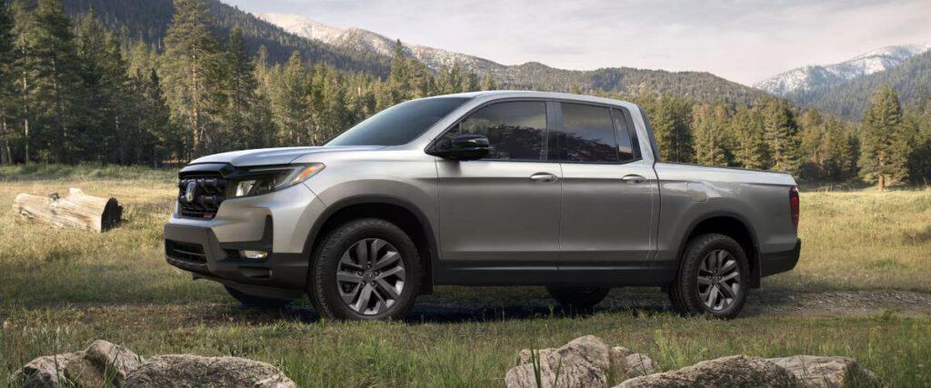 2025 Honda Ridgeline TrailSport in grassy field